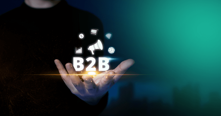 A persons hand holding the words "B2B" in their palm, symbolizing the work of popular Belgium B2B IT Reseller